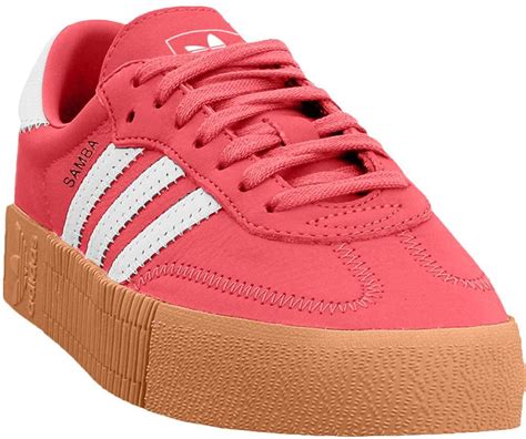 red and pink adidas trainers